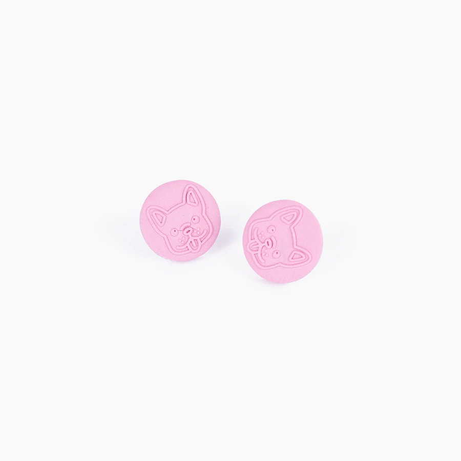 One Pair of Circular Pink Stud Earrings with cute dog embossed feature